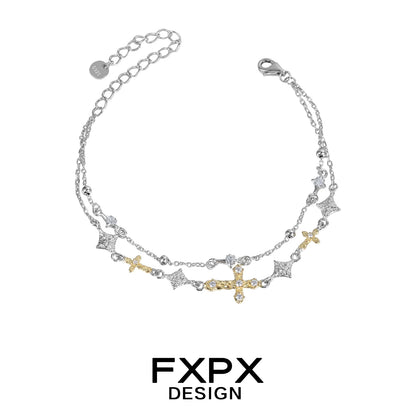 FXPX gold cross silver bracelet featuring stylish gold and silver design with decorative charms