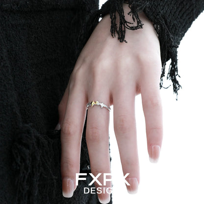 Stylish gold star ring by FXPX showcased on a model's hand with unique design
