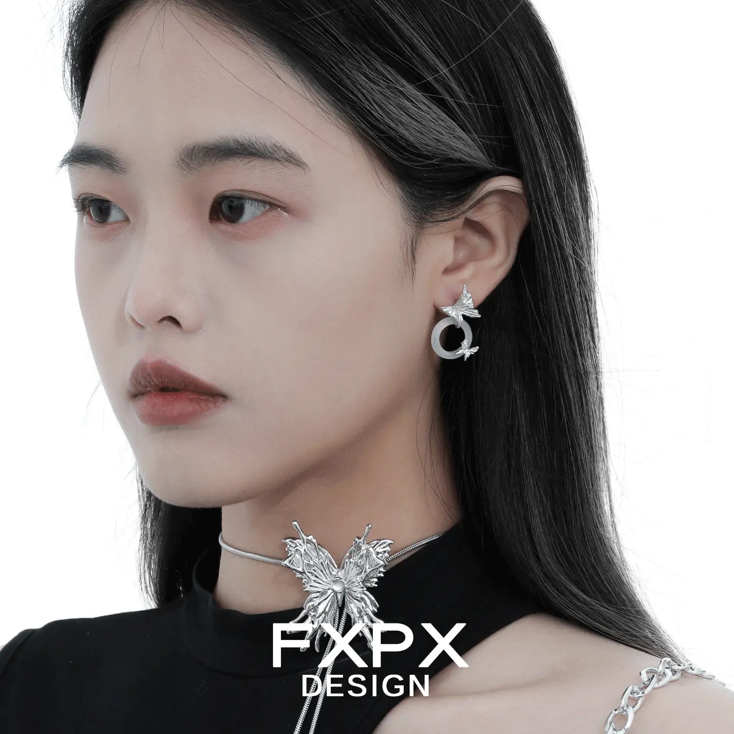 Gothhalo jewelry modern butterfly hoop earrings worn by woman with matching butterfly necklace