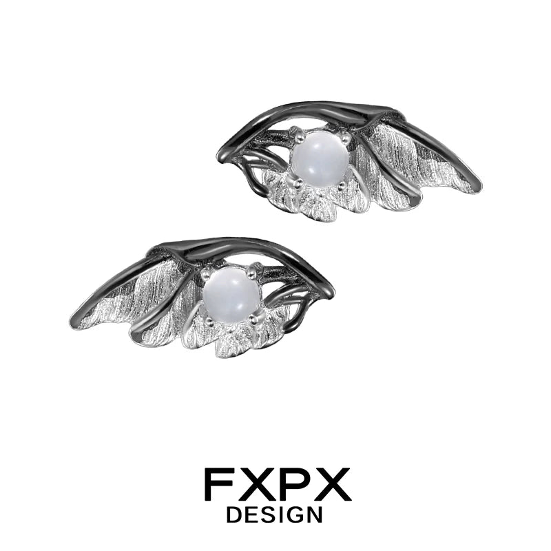FXPX gothic angel wing earrings with intricate leaf design and a pearl accent