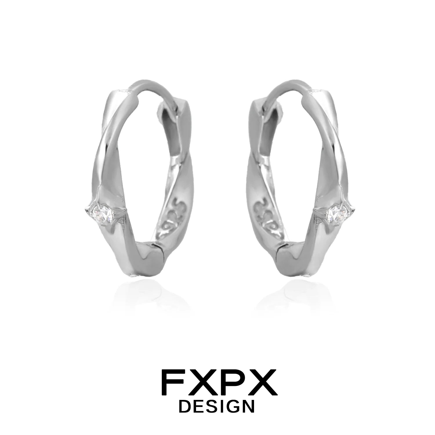 Silver FXPX gothic cross earrings featuring a unique twisted design and sparkling accents