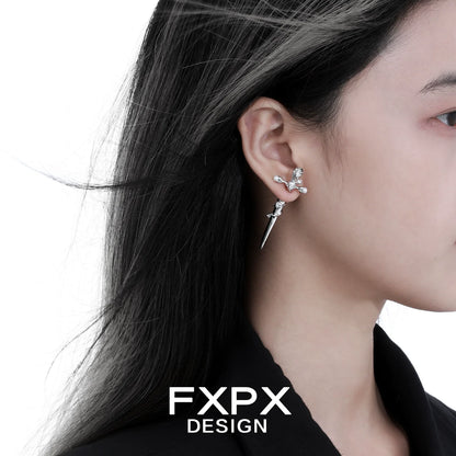 FXPX gothic rose cross earrings elegantly displayed on a model's ear showcasing unique design