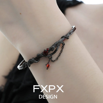 FXPX gothic rose snake bracelet featuring intricate design and red gemstone accents