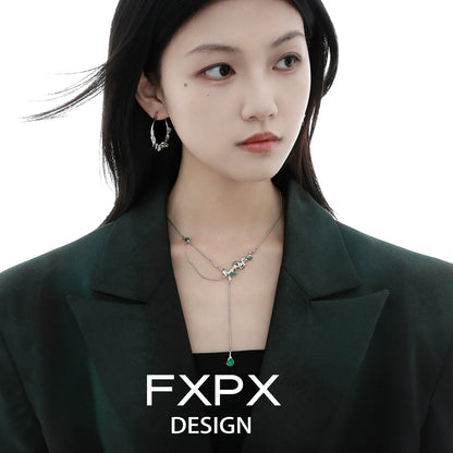 Stylish model wearing a FXPX gothic snake necklace with unique design and intricate details