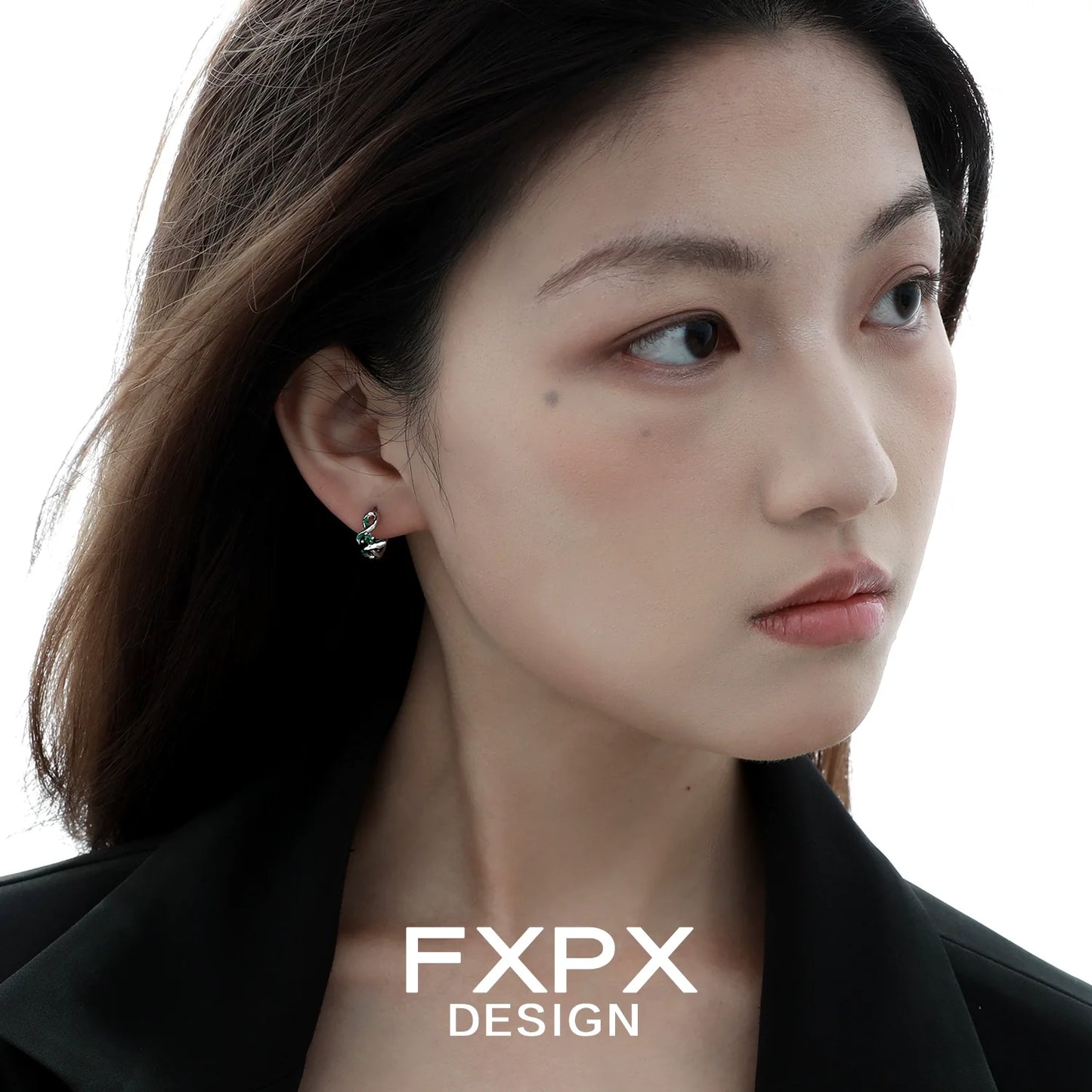 Stylish FXPX green snake earrings worn by a model showcasing unique design and elegance