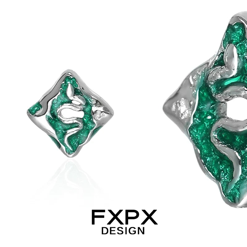 FXPX green snake earrings featuring intricate design and vibrant green color, perfect for unique fashion statement