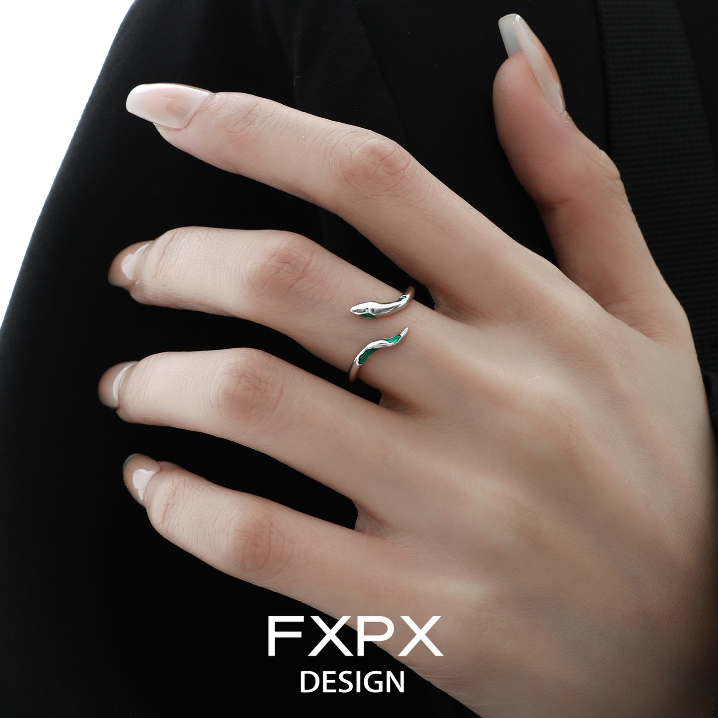 Stylish FXPX green snake ring for women on a model's hand showcasing a unique design