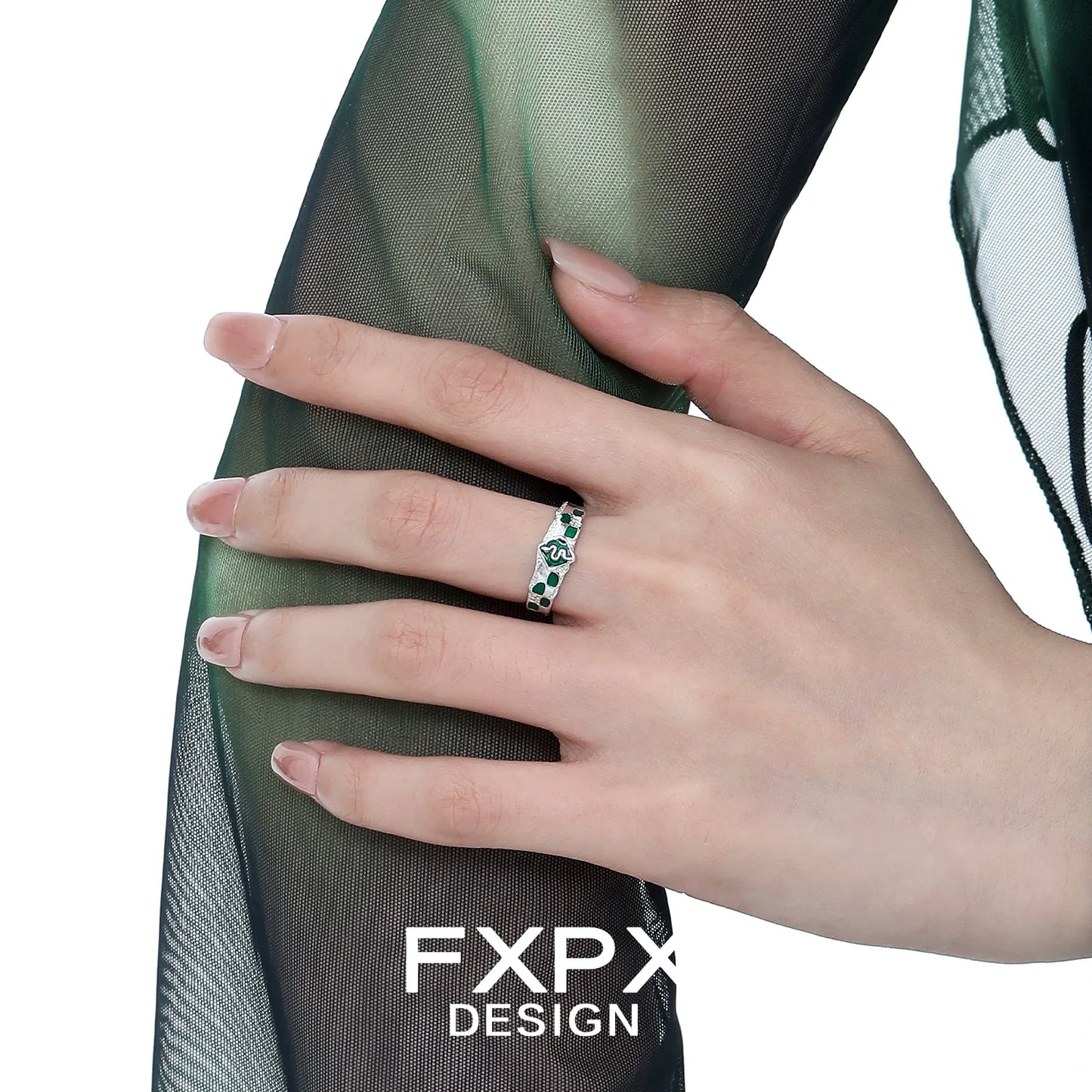 Elegant FXPX green snake ring featuring intricate design details worn on a model's hand