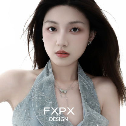 Elegant model wearing a green zircon double layer necklace, showcasing its shimmering design and delicate charm