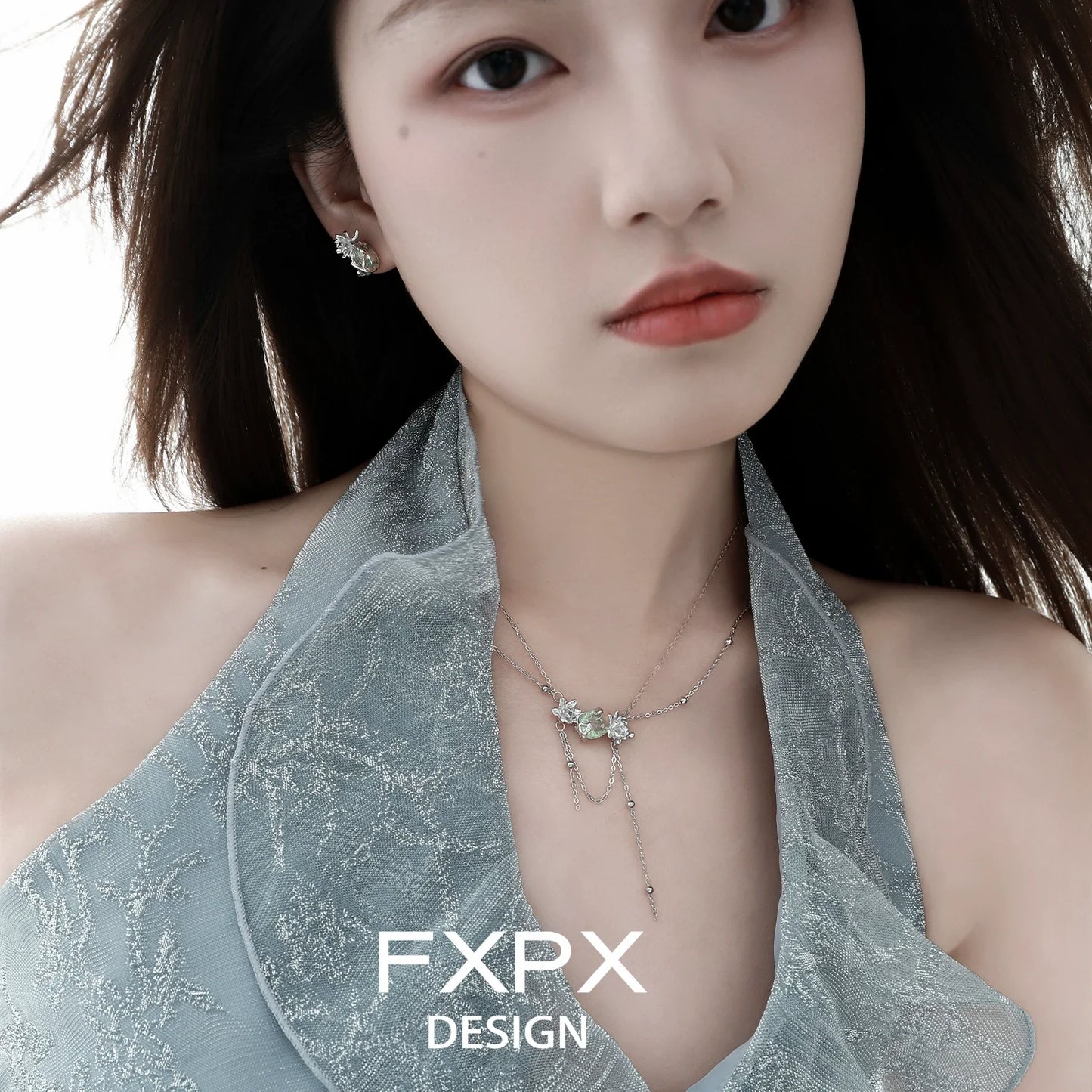 FXPX green zircon double layer necklace worn by model with elegant hairstyle and stylish outfit