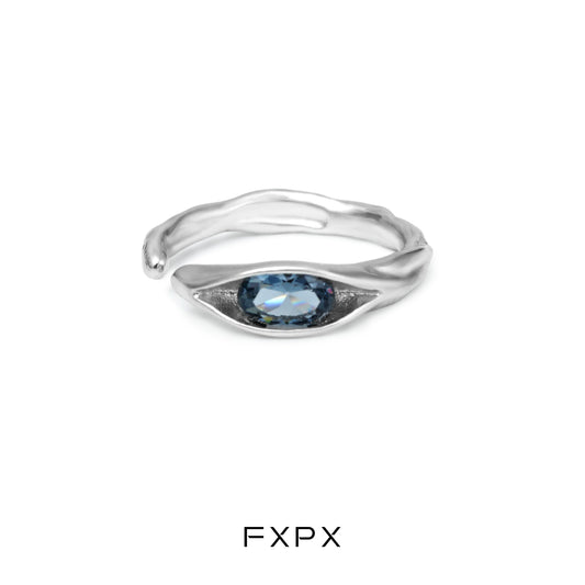 FXPX Iceland blue zircon ring in a sleek silver design with an elegant oval stone