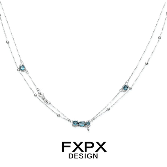 Stunning FXPX Icelandic blue zircon necklace with elegant silver detailing and multiple gemstone accents