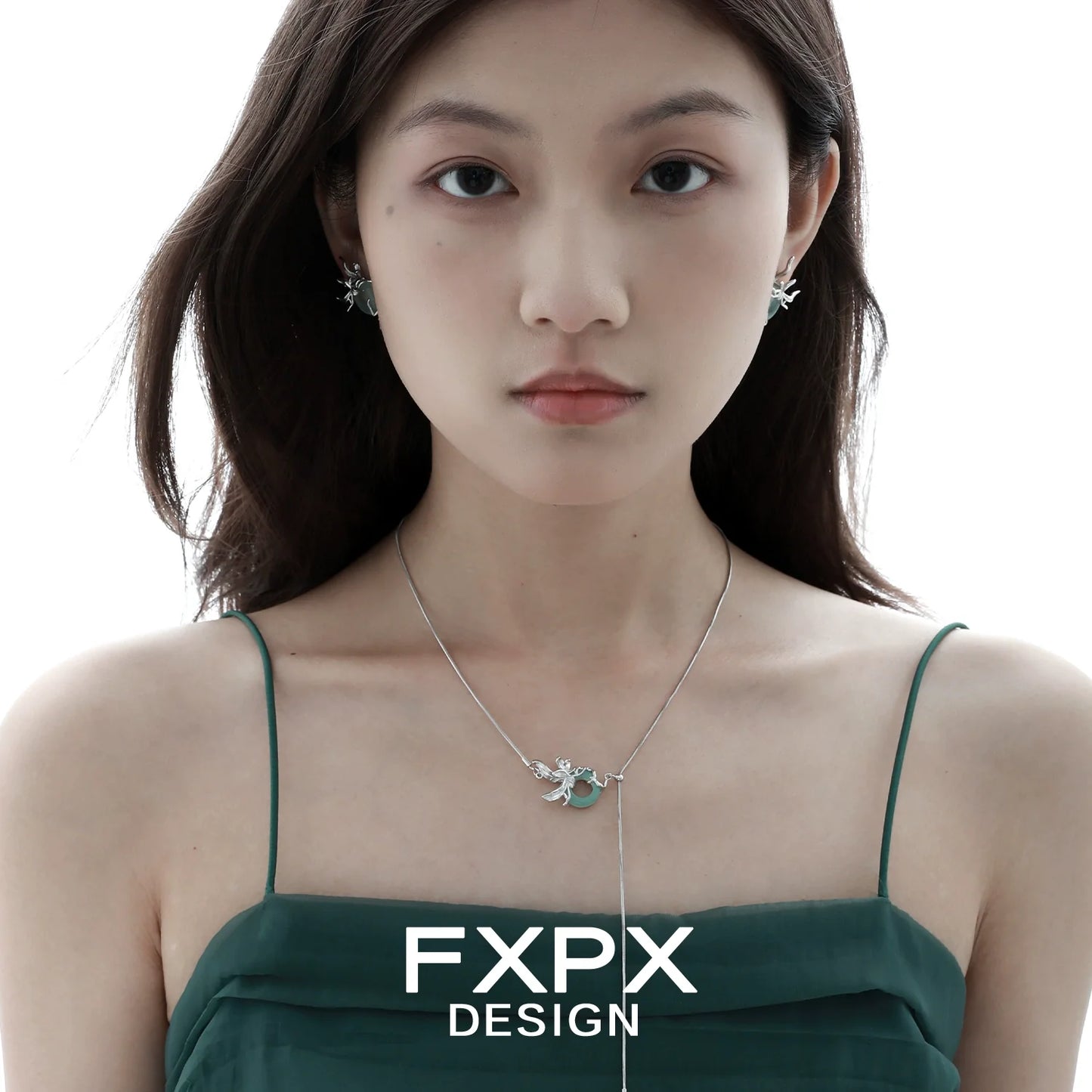 Iris safety buckle necklace by FXPX showcased on a model with elegant earrings