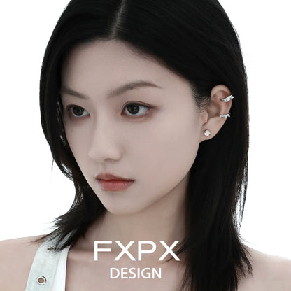 Irregular silver earrings designed by FXPX, showcasing a unique and modern style