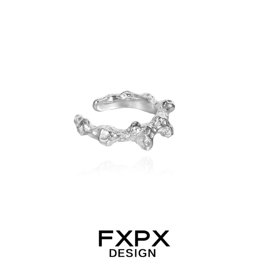 Irregular silver earrings by FXPX with a unique textured design for modern elegance