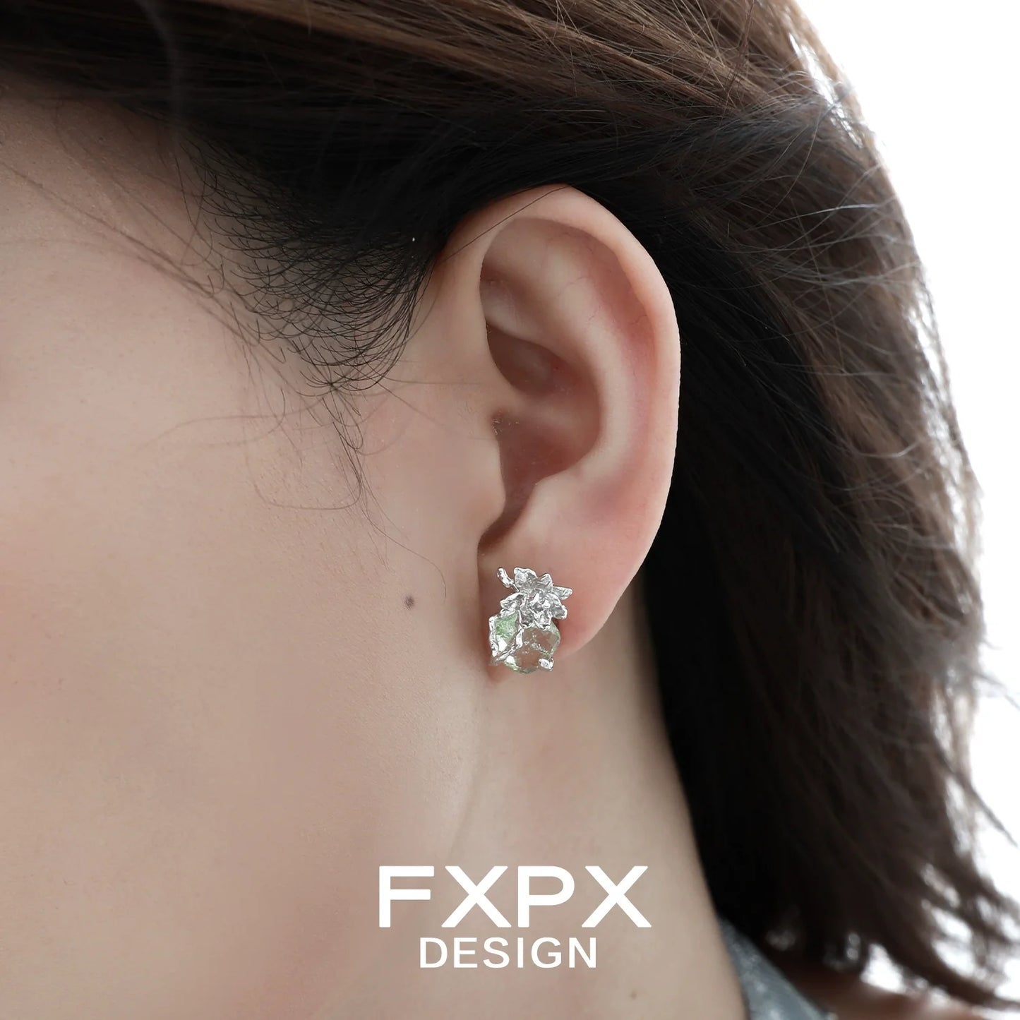 Elegant jasmine green zircon earrings set in a classic design for stylish everyday wear