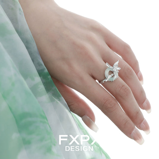 FXPX Lake Iris Silver Ring showcased on a hand with elegant fashion attire