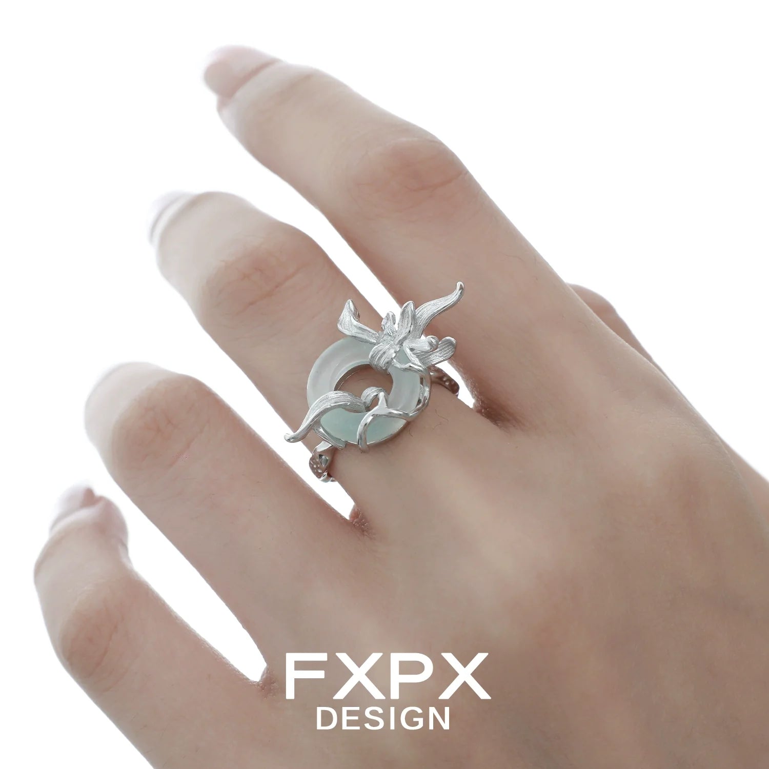 Lake iris silver ring from FXPX featuring a unique floral design on a delicate band