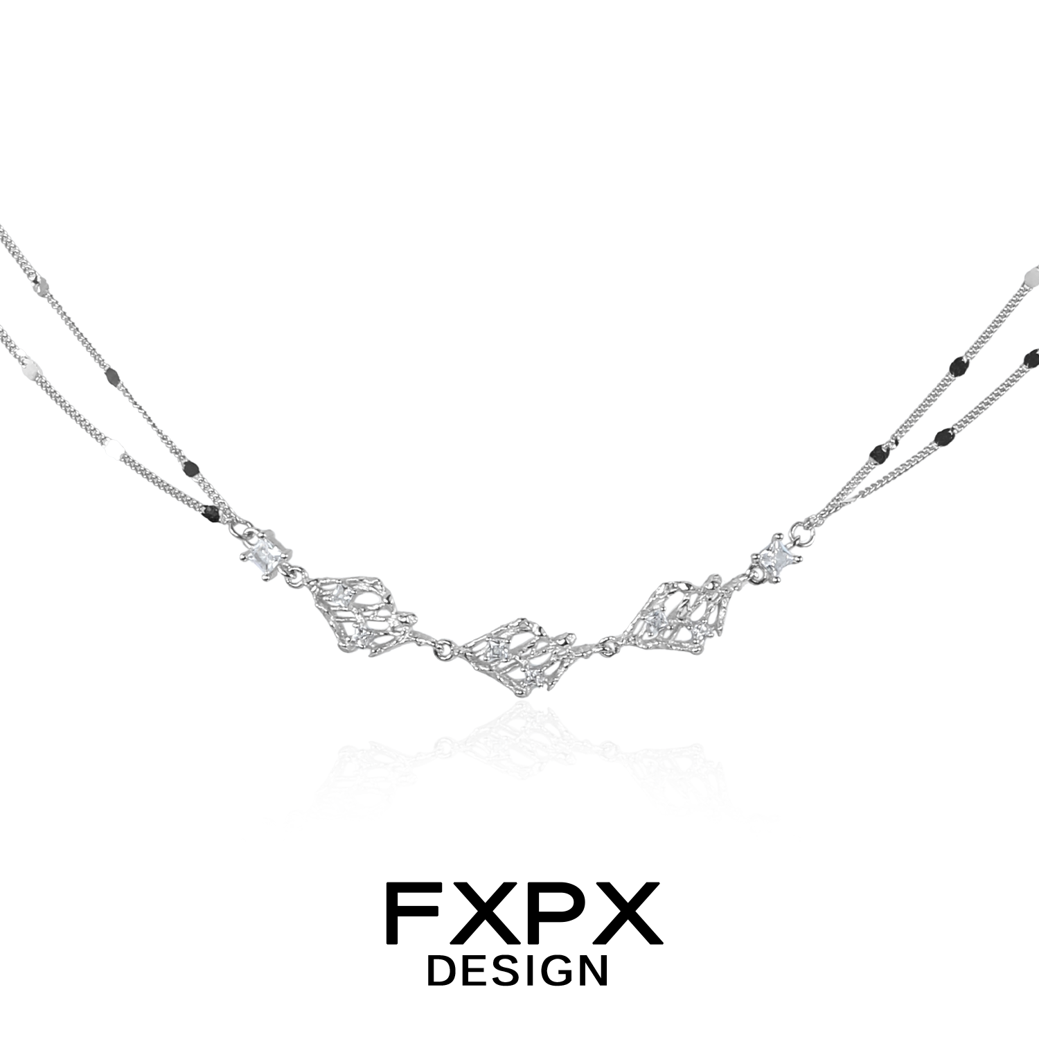 Layered silver gothic necklace by FXPX featuring intricate designs and stylish black accents