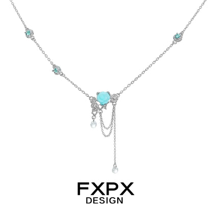 Elegant light blue rose pendant necklace by FXPX with delicate silver chain and accent stones