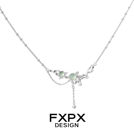 Elegant silver lotus pendant necklace featuring green gemstones for a sophisticated look