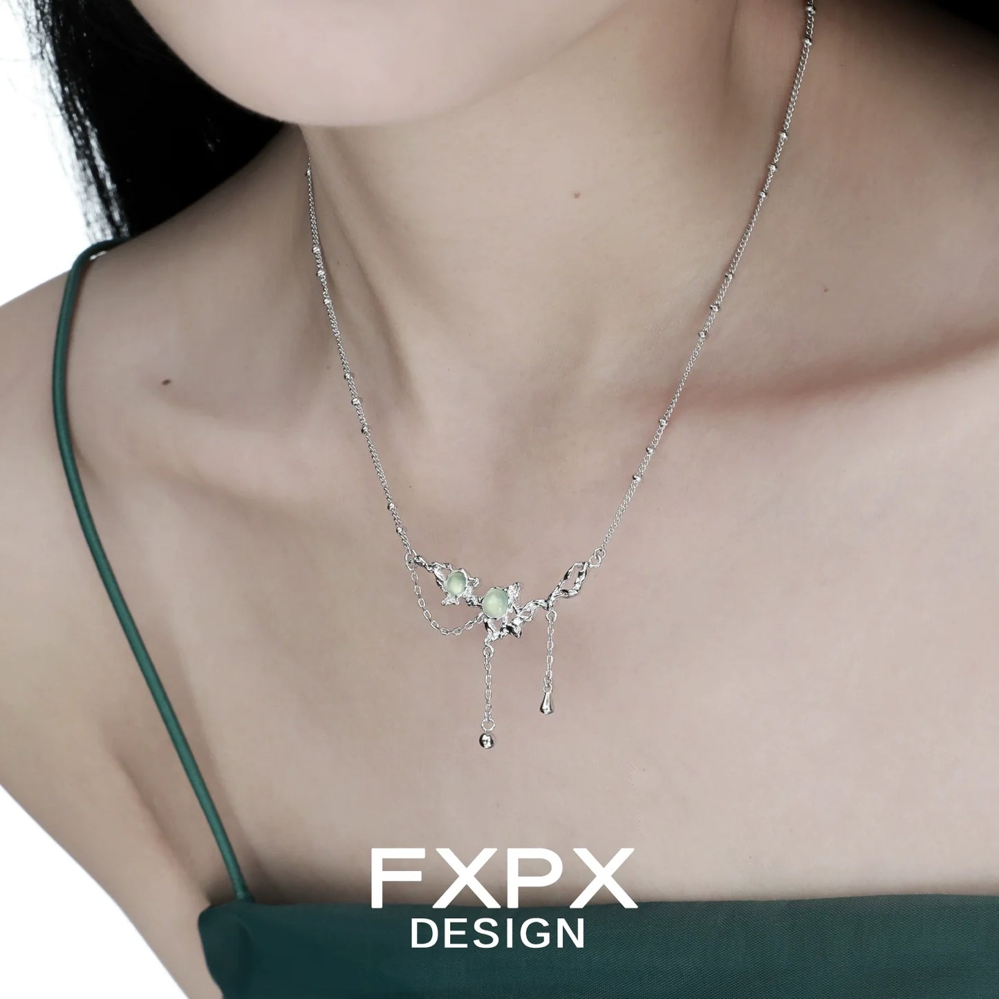 Elegant FXPX lotus pendant necklace featuring floral design and delicate chain detail