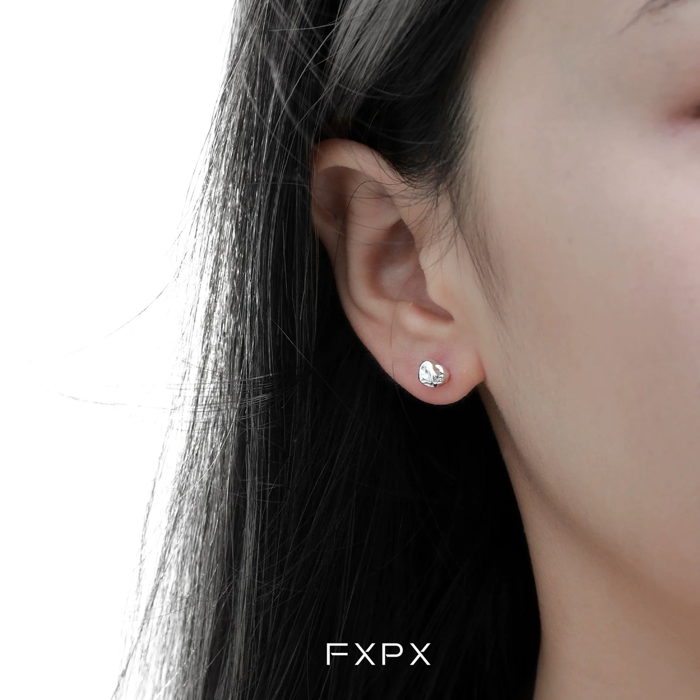 Elegant FXPX meteorite stud earrings showcasing a unique cosmic design for a modern look