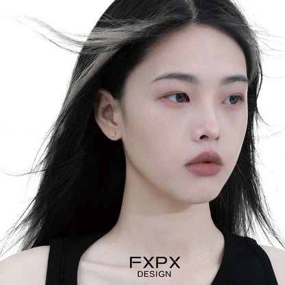 Model wearing minimal rose silver earrings, showcasing elegant and simple design for everyday wear