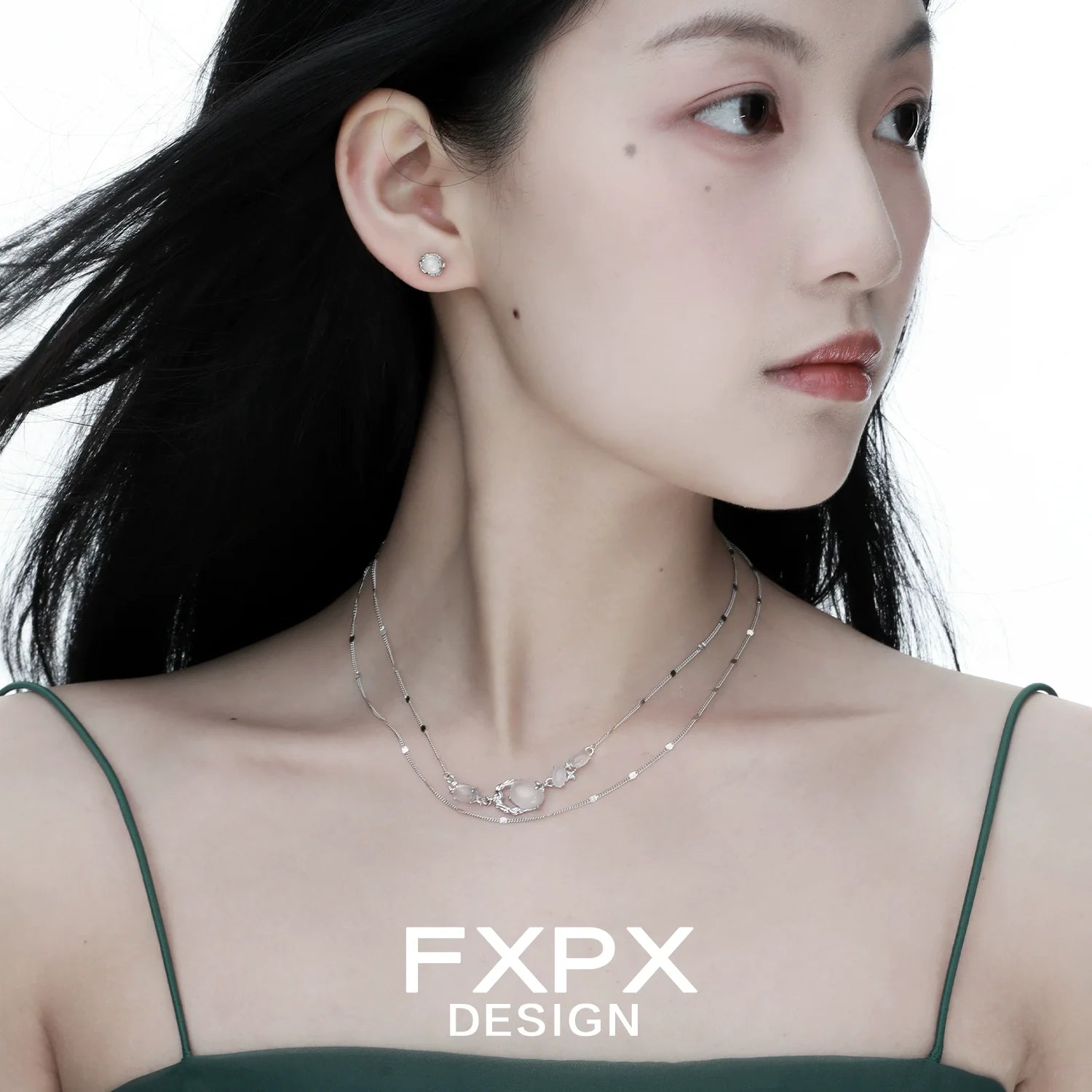 Elegant FXPX minimalist agate necklace worn by a woman with stylish earrings