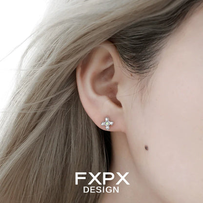 Minimalist cross earrings by FXPX featuring a delicate design perfect for everyday wear