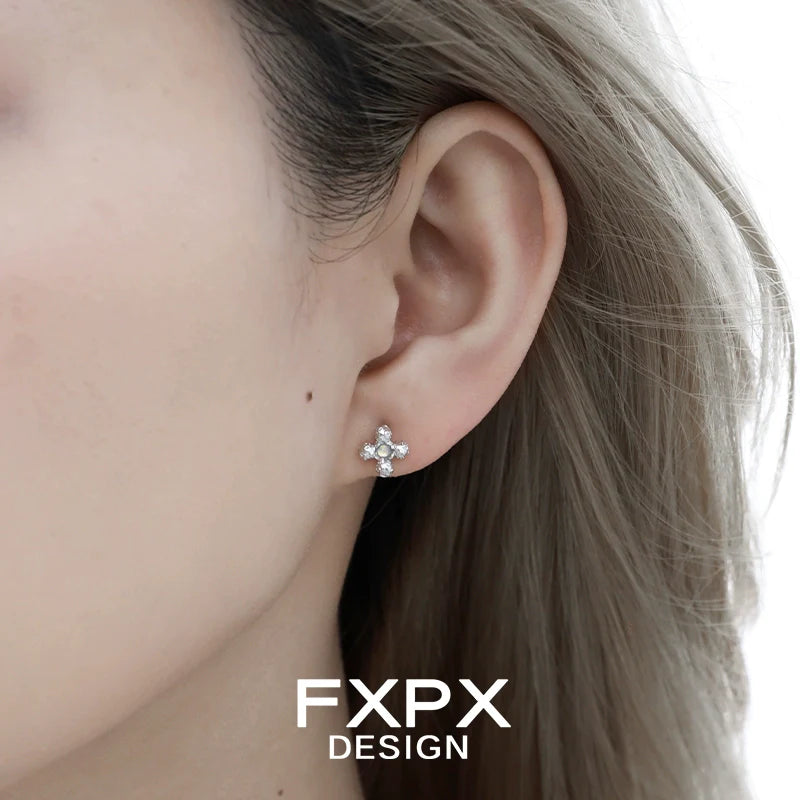 Elegant minimalist cross earrings by FXPX featuring a delicate design for everyday wear