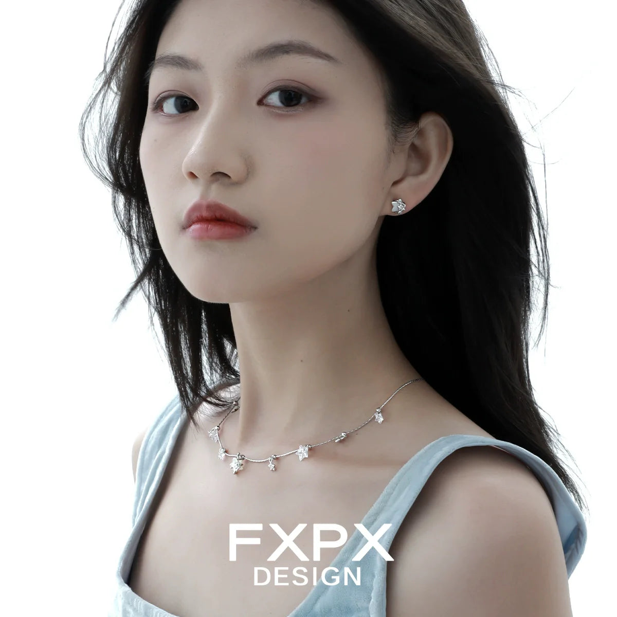 Elegant minimalist star shell earrings designed by FXPX, perfect for enhancing any outfit