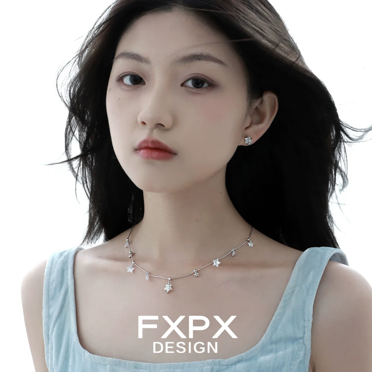 Minimalist star shell earrings by FXPX, featuring a simple and elegant design suitable for any occasion