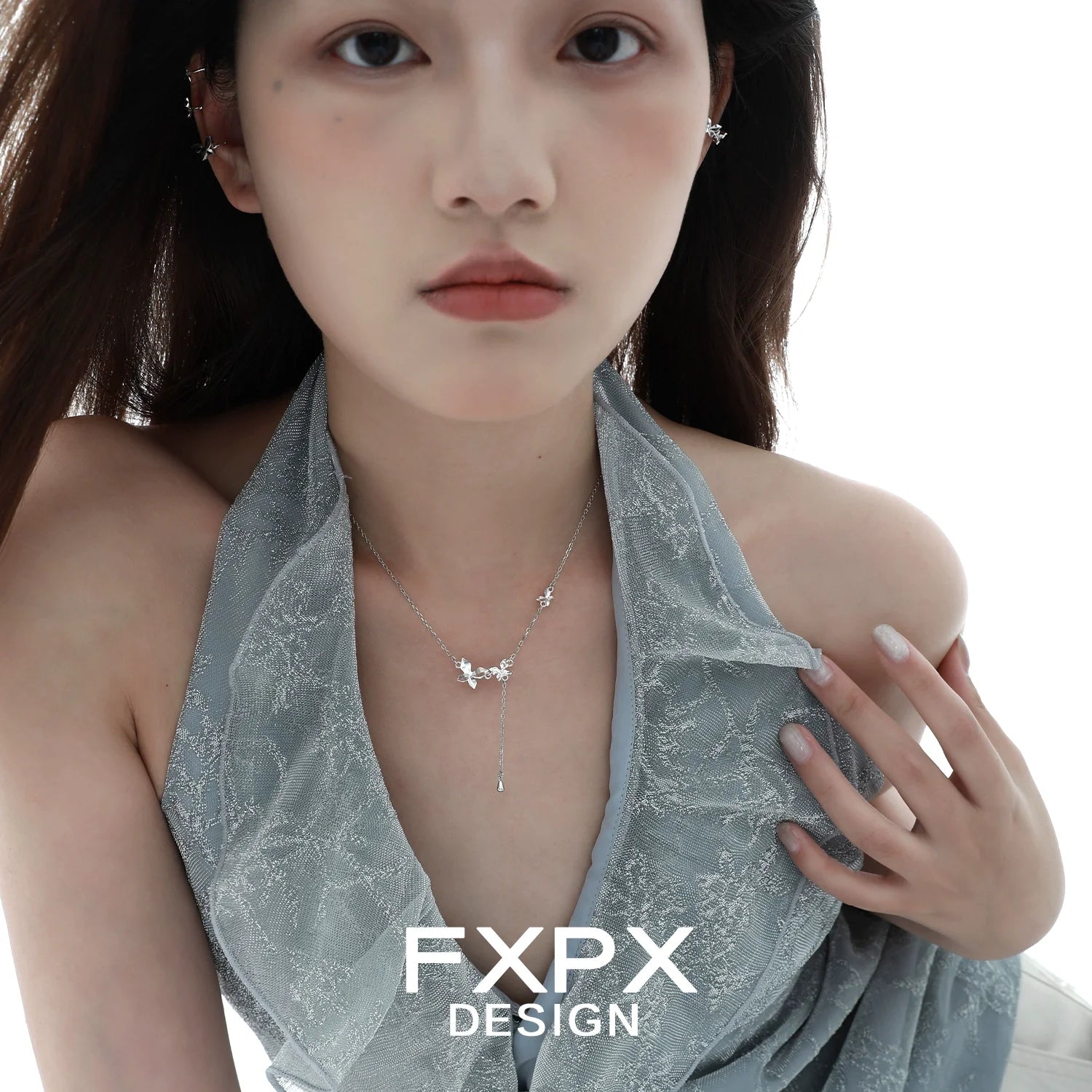 Elegant mirror butterfly pendant necklace by FXPX, featuring a delicate butterfly design with shimmering details