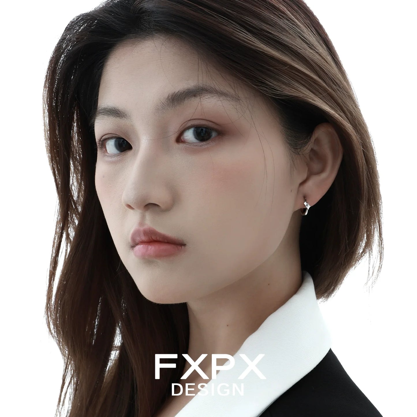 Model wearing mirror square silver earrings for a stylish and modern look