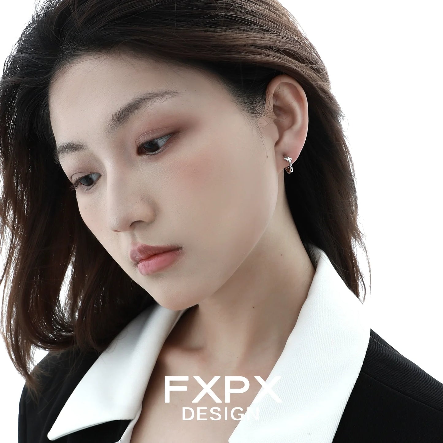 Stylish mirror square silver earrings showcased on a model with a sleek hairstyle