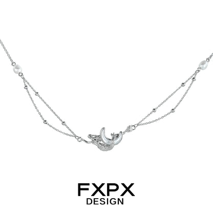 FXPX moon shell necklace in silver with delicate pearls and intricate design