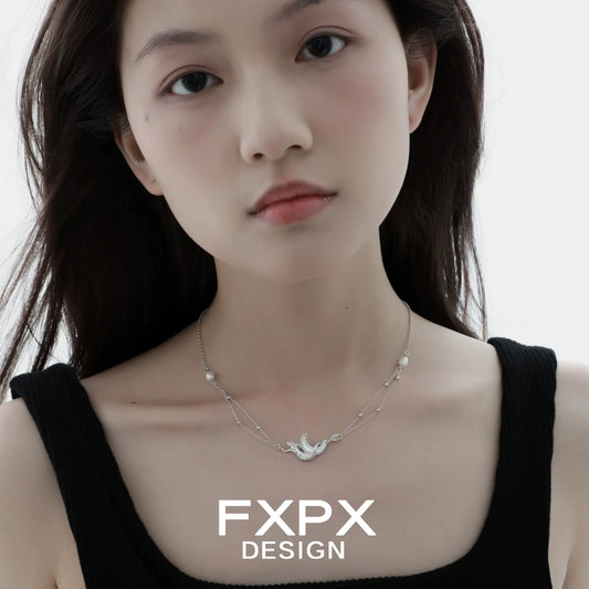 Stylish FXPX moon shell necklace with delicate design featuring pearls and a crescent moon pendant