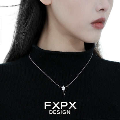 Elegant moon star silver necklace worn by a model with a black sweater, perfect for daily wear