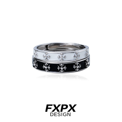 FXPX mystery couple rings set featuring sleek black and white designs with floral patterns