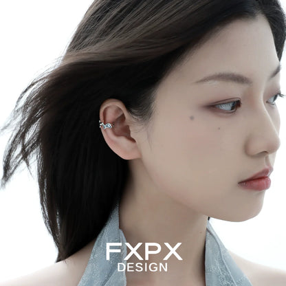 FXPX Mystic Island ear cuff worn elegantly on a model's ear for a stylish look