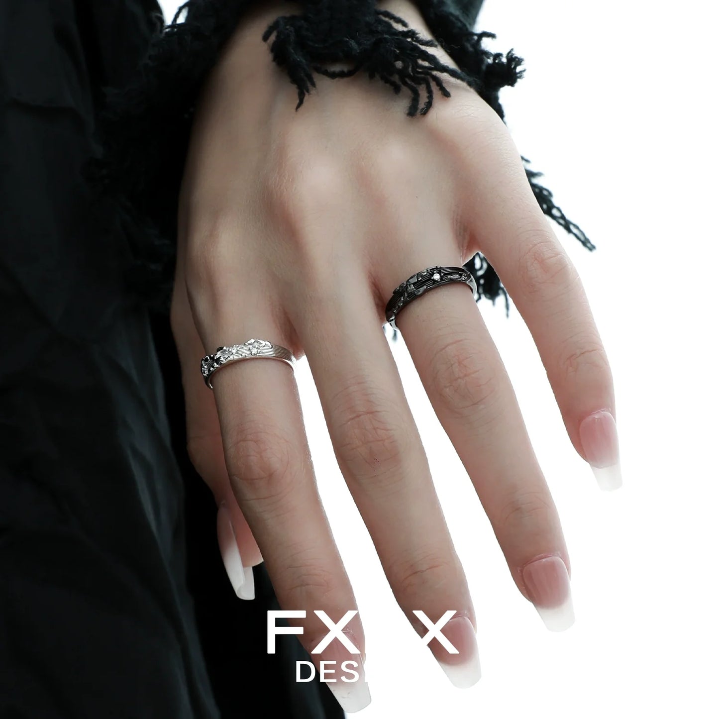Stylish FXPX mystic map couple rings in silver and black designs, perfect for partners