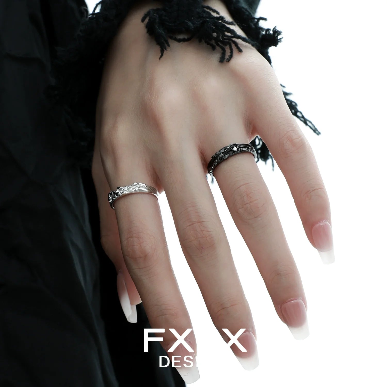 Stylish FXPX mystic map couple rings in silver and black designs, perfect for partners