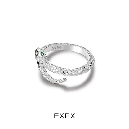 FXPX Ouroboros silver ring featuring a snake design with intricate detailing and a green stone