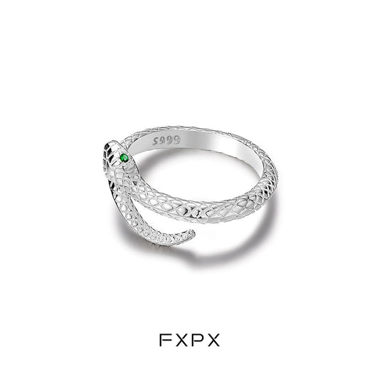 FXPX Ouroboros silver ring featuring a snake design with intricate detailing and a green stone