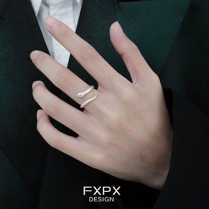 FXPX Ouroboros silver ring stylishly worn on a hand for modern fashion enthusiasts