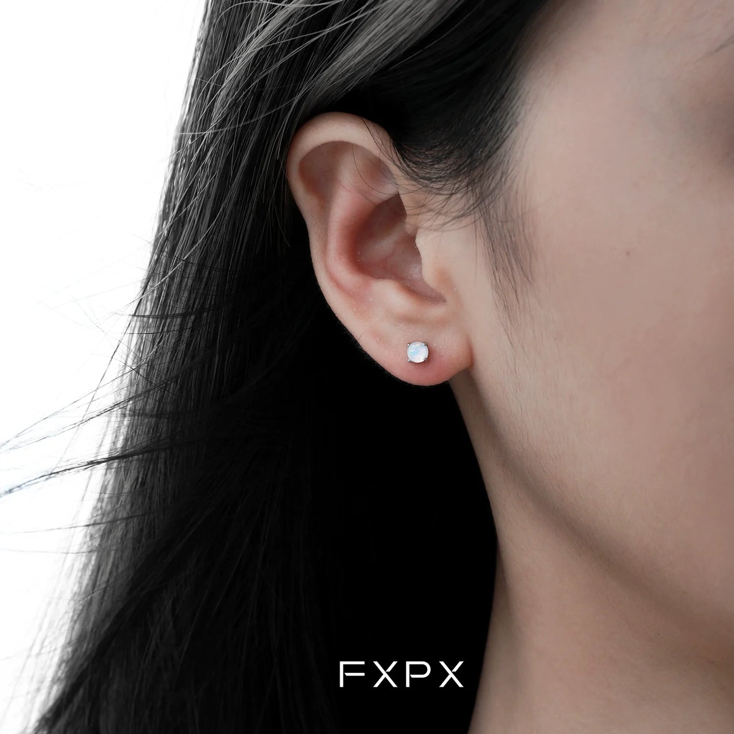 Elegant pink rose stud earrings showcased on a model, perfect for any occasion