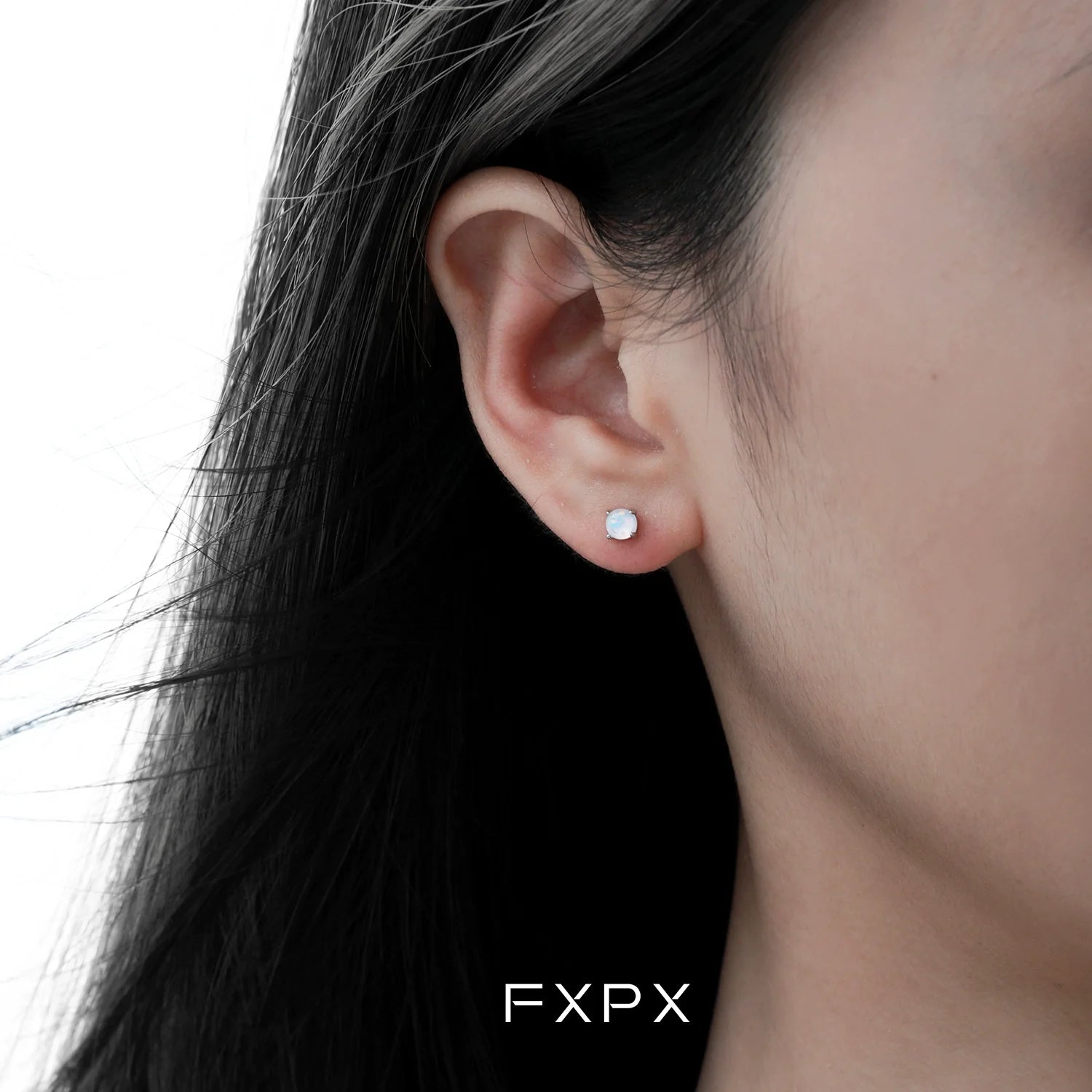 Elegant pink rose stud earrings showcased on a model, perfect for any occasion