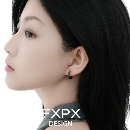 Stylish FXPX Pixiu hoop earrings displayed on a model with elegant features