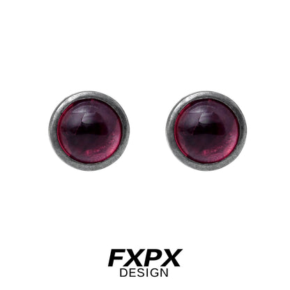 FXPX punk crystal stud earrings in deep purple with a sleek metallic setting